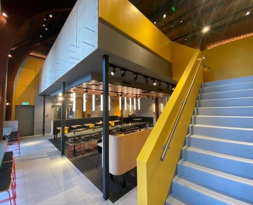 CORA Projects - McDonalds CNSTRCT Corian trap Imperial Yellow 6